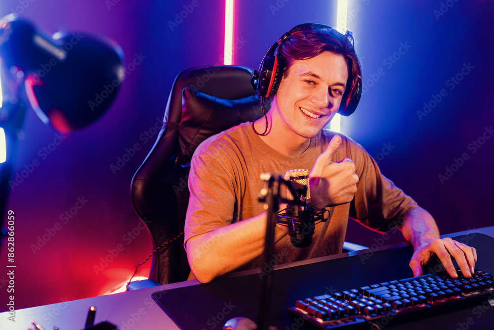 Host Streamer Host channel of gaming smart streamer playing online game, wearing ...