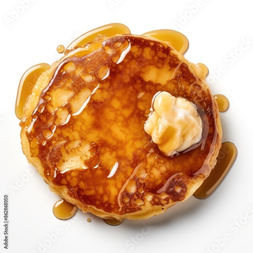 Close-Up of Golden Malpua Pancake with Syrup and Butter photo