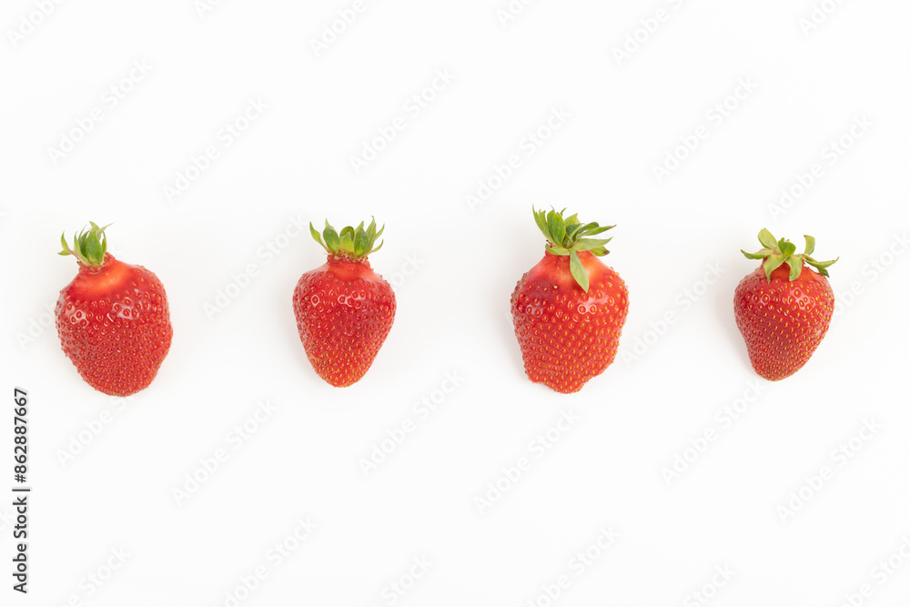 Ripe strawberries isolated on a white Ripe strawberries isolated on a white