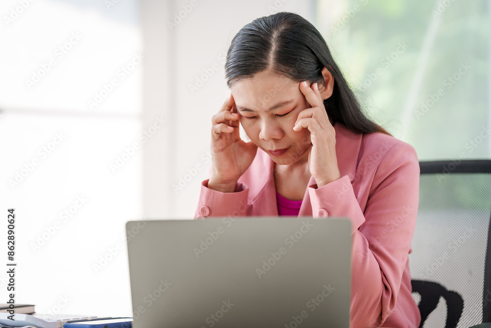 40-year-old middle-aged Asian businesswoman wearing pink suit, business finance, investment strategies, risk management. Skilled in planning, analysis, operations control for business success. 40-year-old middle-aged Asian businesswoman wearing pink suit, business finance, investment strategies, risk management. Skilled in planning, analysis, operations control for business success.