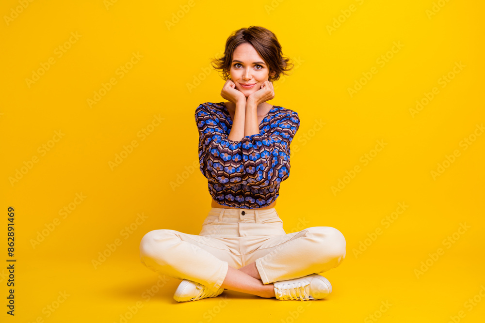 Full body length photo of young lovely girl touch cheeks sweet model posing happiness looking at you isolated on yellow color background Full body length photo of young lovely girl touch cheeks sweet model posing happiness looking at you isolated on yellow color background