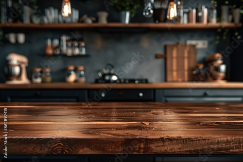 Brown natural wooden kitchen island table top with copy space for product advertising over blurred dark classic kitchen background at home