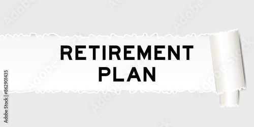 Ripped gray paper background that have word retirement plan under torn part