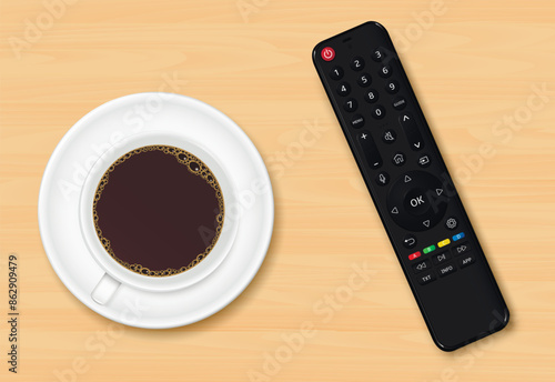 TV remote control and coffee cup top view