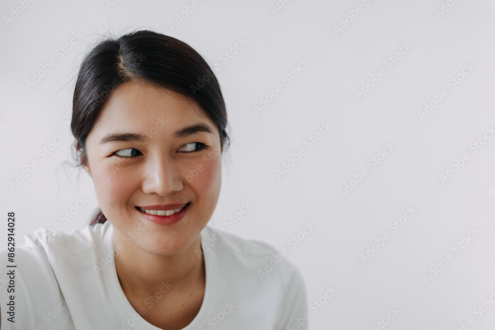 Portrait of asian Thai woman, cunning tricky face and smirk, pointing finger to camera, scheming evil plan, secret isolated over white background wall. Portrait of asian Thai woman, cunning tricky face and smirk, pointing finger to camera, scheming evil plan, secret isolated over white background wall.