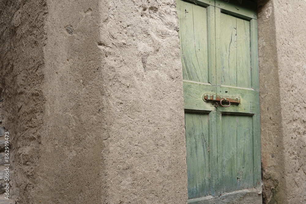 View of some details in an alley in the historic center of Pognana. Late Como, Italy View of some details in an alley in the historic center of Pognana. Late Como, Italy