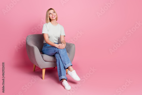 Photo of cute adorable dreamy girl wear trendy grey clothes look empty space offer isolated on pink color background