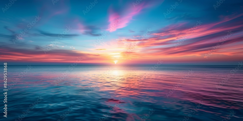 Obraz premium Amazing sunset over calm ocean.