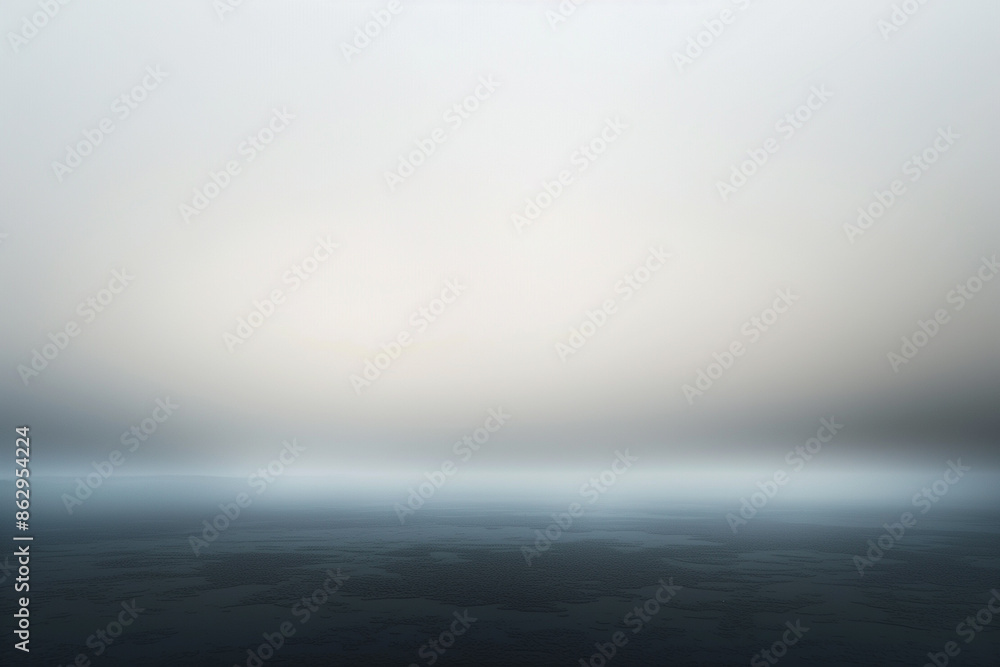 Misty horizon over calm ocean at dawn Misty horizon over calm ocean at dawn