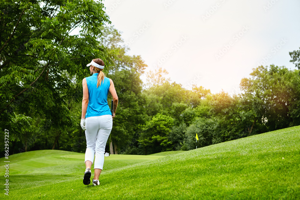 Back, woman and walking at golf course for sports talent or professional skill and practice. Hobby, activity and match at club or field for tournament, competition and game with training for health Back, woman and walking at golf course for sports talent or professional skill and practice. Hobby, activity and match at club or field for tournament, competition and game with training for health