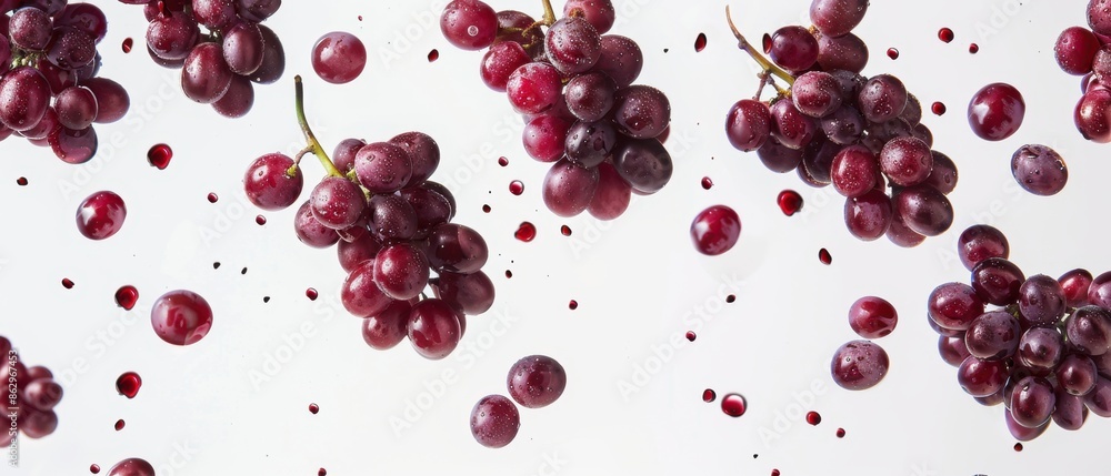 Red Grapes in Mid-Air Red Grapes in Mid-Air
