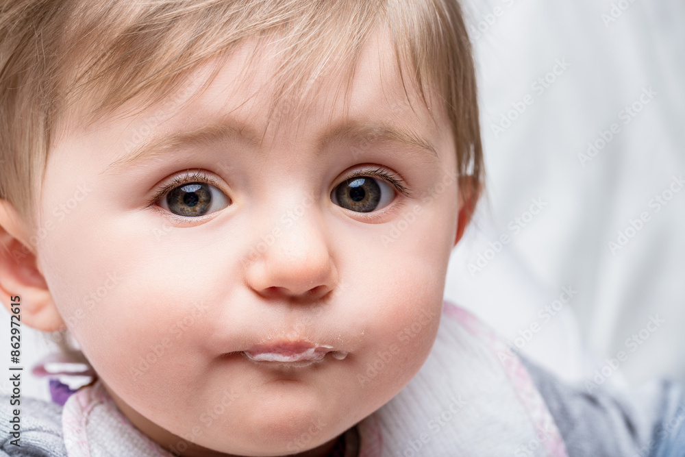 Adorable baby girl making a funny face and drooling Adorable baby girl making a funny face and drooling