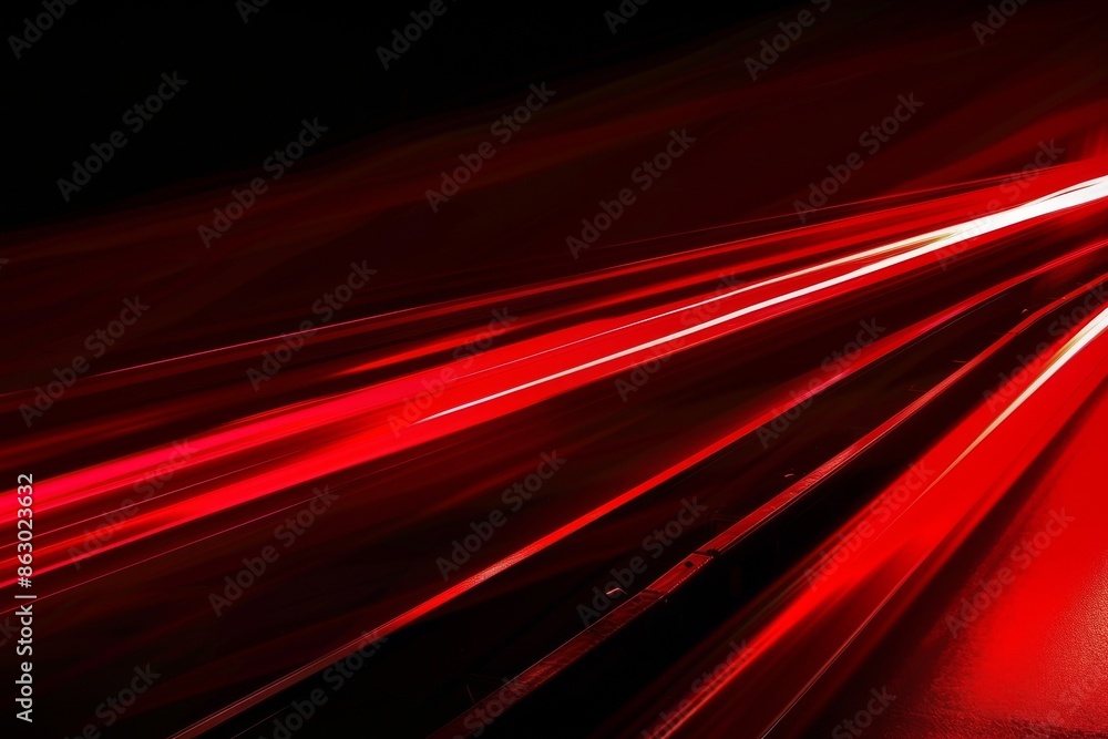 Abstract red lines depict the speed of the road in red. Red light trails on a dark background, Design of albums, notebooks, banners, postcards, posters Abstract red lines depict the speed of the road in red. Red light trails on a dark background, Design of albums, notebooks, banners, postcards, posters