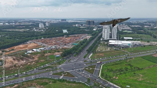 Drone Hyperlapse of Vo Van Kiet & Hung Vuong Intersection at Rush Hour | WTC Tower & Binh Duong Administration Center photo