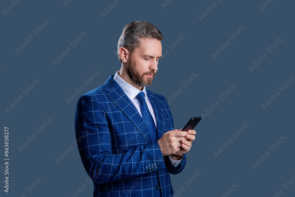Social network. Hispanic business man with phone. Businessman using phone. Hold the line. Man phone conversation isolated on grey. Businessman chatting. Businessman texting and messaging Social network. Hispanic business man with phone. Businessman using phone. Hold the line. Man phone conversation isolated on grey. Businessman chatting. Businessman texting and messaging