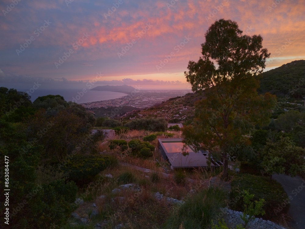 Φωτογραφία Swimming pool with view of the sea from the hills surrounding Terracina, Italy, at dusk