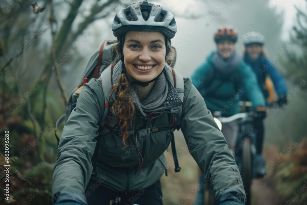 Cycling with friends in misty forest. Cycling with friends in misty forest.