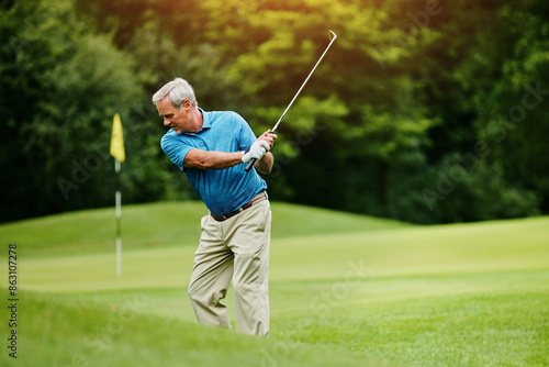Senior man, golf stroke and sports with wellness, retirement and playing with grass field. Active, pensioner and mature guy with club, active and hobby with weekend break, motion and skills for game