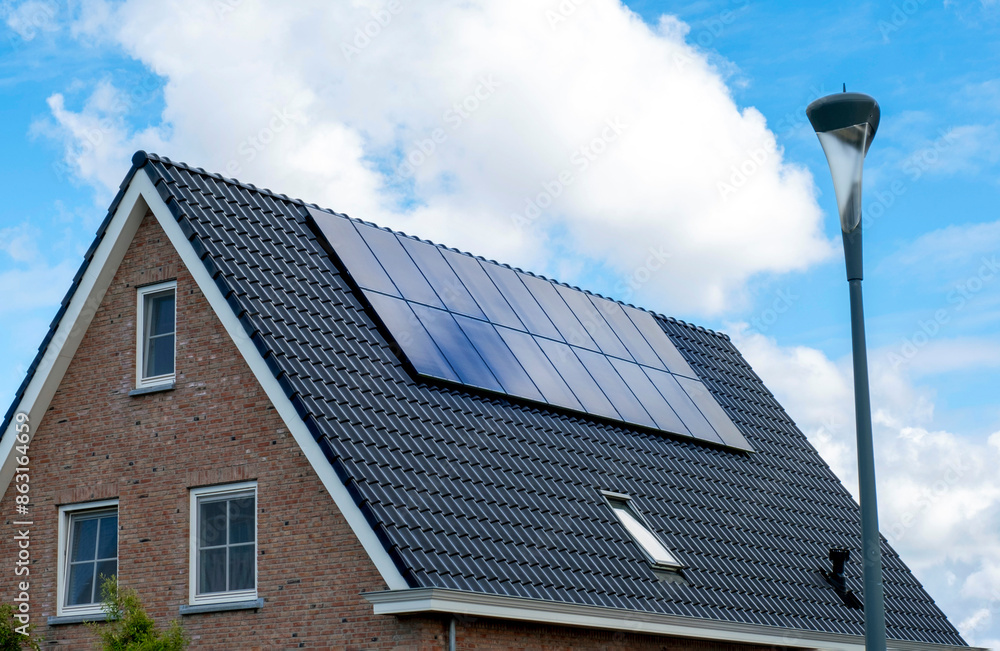 Fototapeta premium Solar Panel House Roof Generator Energy The Hague Netherlands Blue Sky Sun