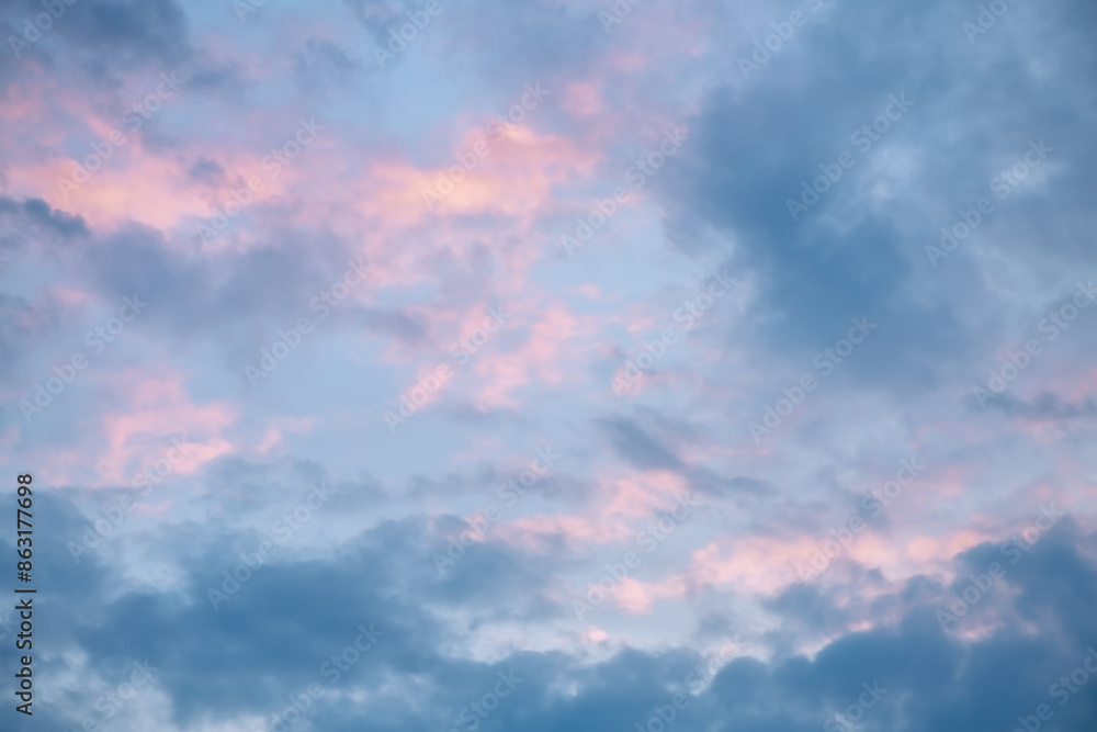 Beautiful clouds in the sky at sunset, pink and blue, natural background, romance, magic Beautiful clouds in the sky at sunset, pink and blue, natural background, romance, magic