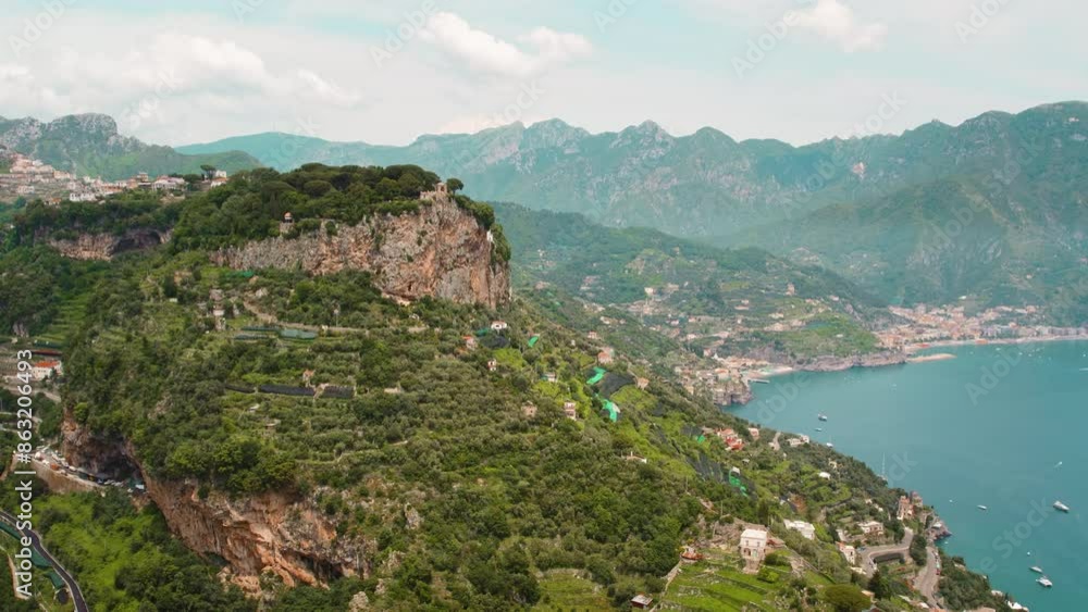 Amalfi coast with terraced fields, lush greenery under the backdrop of rugged mountains. Summer landscape in Italy. Amalfi coast with terraced fields, lush greenery under the backdrop of rugged mountains. Summer landscape in Italy.