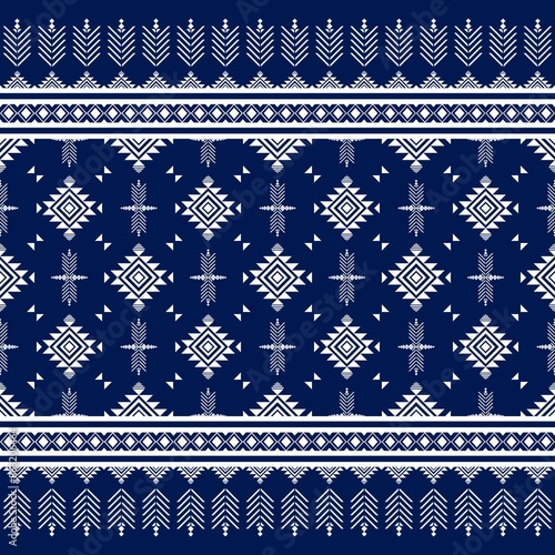 Native fabric pattern white geometric shapes blue background