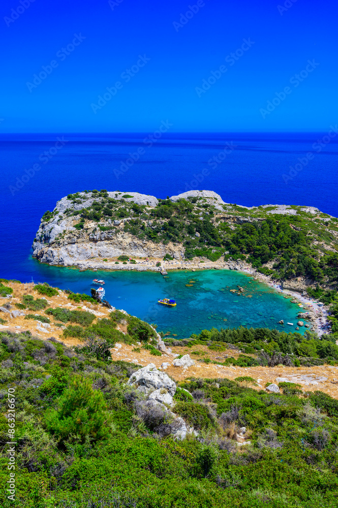 Anthony Quinn Bay - beautiful coast scenery with paradise beach on Rhodos island - travel destination in Greece, Europe Anthony Quinn Bay - beautiful coast scenery with paradise beach on Rhodos island - travel destination in Greece, Europe