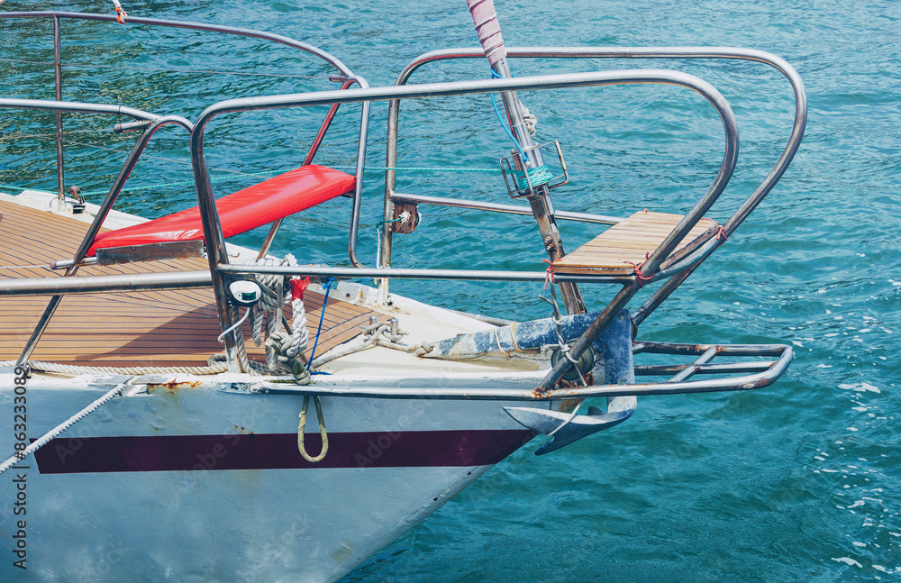 Naklejka premium A fragment of a yacht on the background of the sea, toned. Concept of the sea recreation.