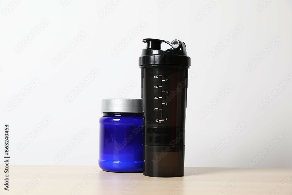 Sports nutrition and various supplements on the table Sports nutrition and various supplements on the table