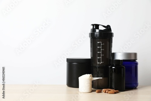 Sports nutrition and various supplements on the table