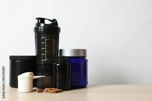 Sports nutrition and various supplements on the table