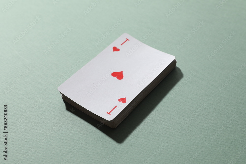 Playing cards on color background, top view. Gambling concept Playing cards on color background, top view. Gambling concept
