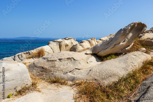 Impressive rocks on the cape of Vourvourou Karydi Beach, Sithonia, Chalkidiki peninsula, Central Macedonia, Northern Greece, Aegean Sea coast photo