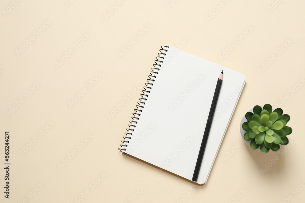 Flat lay with pencil and notebook on color background Flat lay with pencil and notebook on color background