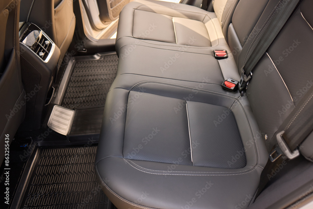 Car back seat with headrest and arm rest, a comfortable automotive fixture Car back seat with headrest and arm rest, a comfortable automotive fixture