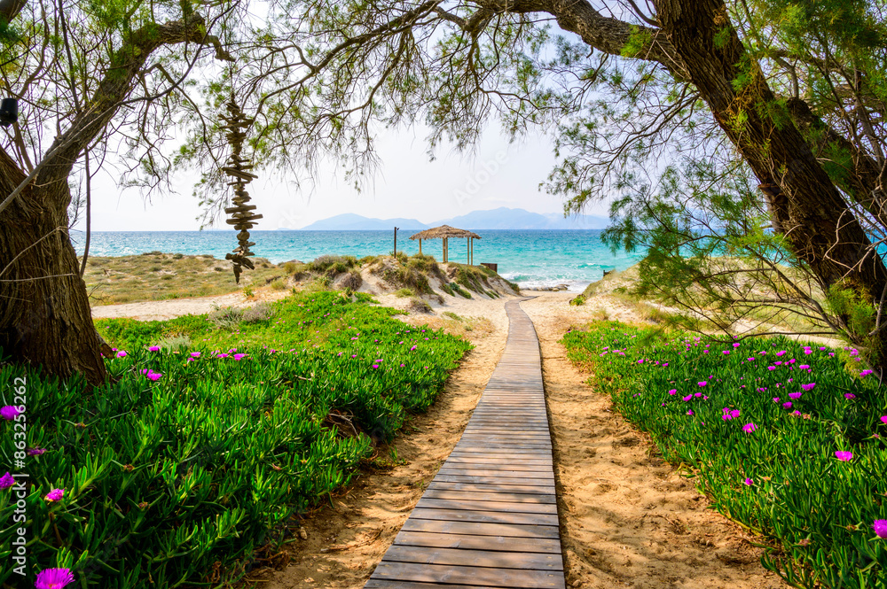 Tam Tam Beach - beautiful coast scenery with paradise beach on island Kos - travel destination in Greece, Europe Tam Tam Beach - beautiful coast scenery with paradise beach on island Kos - travel destination in Greece, Europe