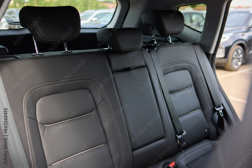 Car back seat with headrest and arm rest, a comfortable automotive fixture Car back seat with headrest and arm rest, a comfortable automotive fixture