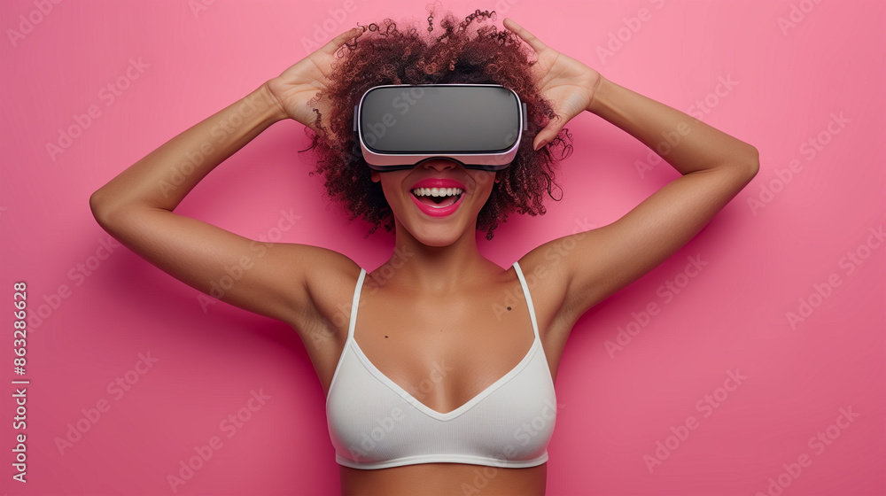 Amazed young woman in virtual reality, using vr glasses headset, standing over gray background Amazed young woman in virtual reality, using vr glasses headset, standing over gray background