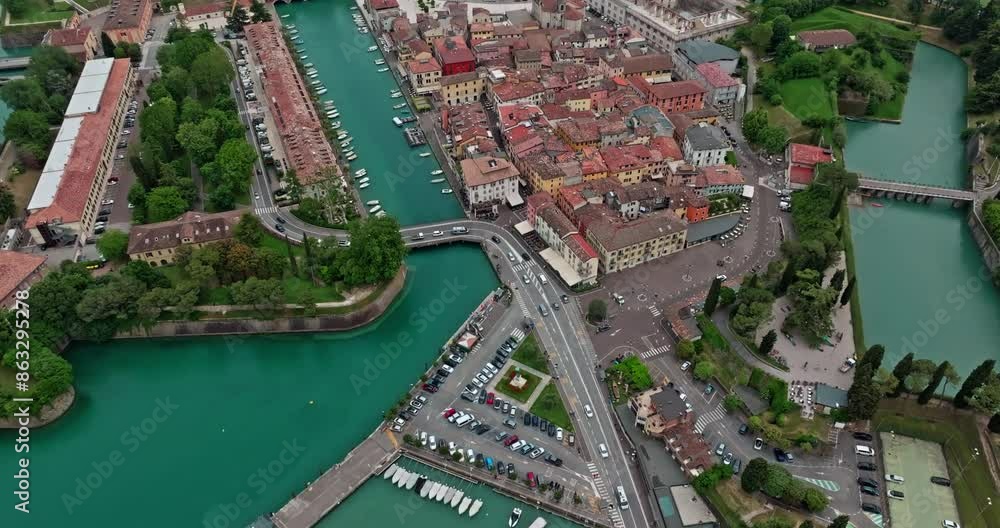 Aerial View of Lake Garda Peschiera del Garda, Italy - Cityscape of Houses, Streets, and Canals, Boats Sailing, Tourism and Travel. High quality 4k footage Aerial View of Lake Garda Peschiera del Garda, Italy - Cityscape of Houses, Streets, and Canals, Boats Sailing, Tourism and Travel. High quality 4k footage