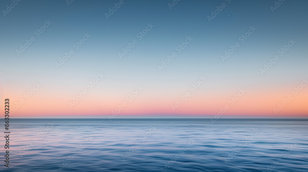 Obraz premium Serene Ocean Horizon at Sunset with Gentle Ripples.