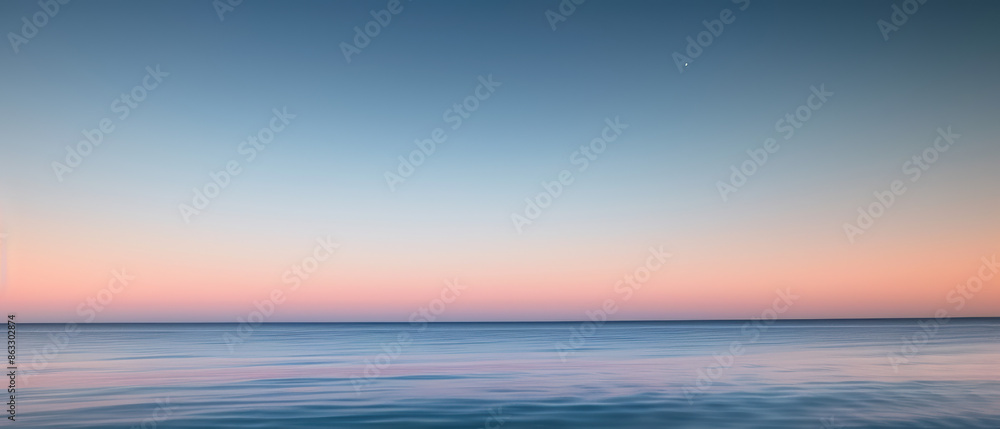 Fototapeta premium Serene Ocean Horizon at Sunset with Gentle Ripples.