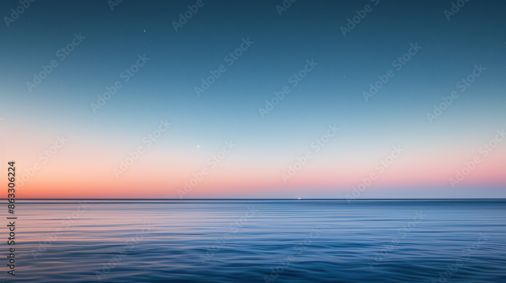 Obraz premium Serene Ocean Horizon at Sunset with Gentle Ripples.