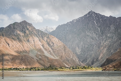 Panorama of rocky mountain peaks and Panj river in Tajikistan Tien Shan mountains on Pamir Highway photo
