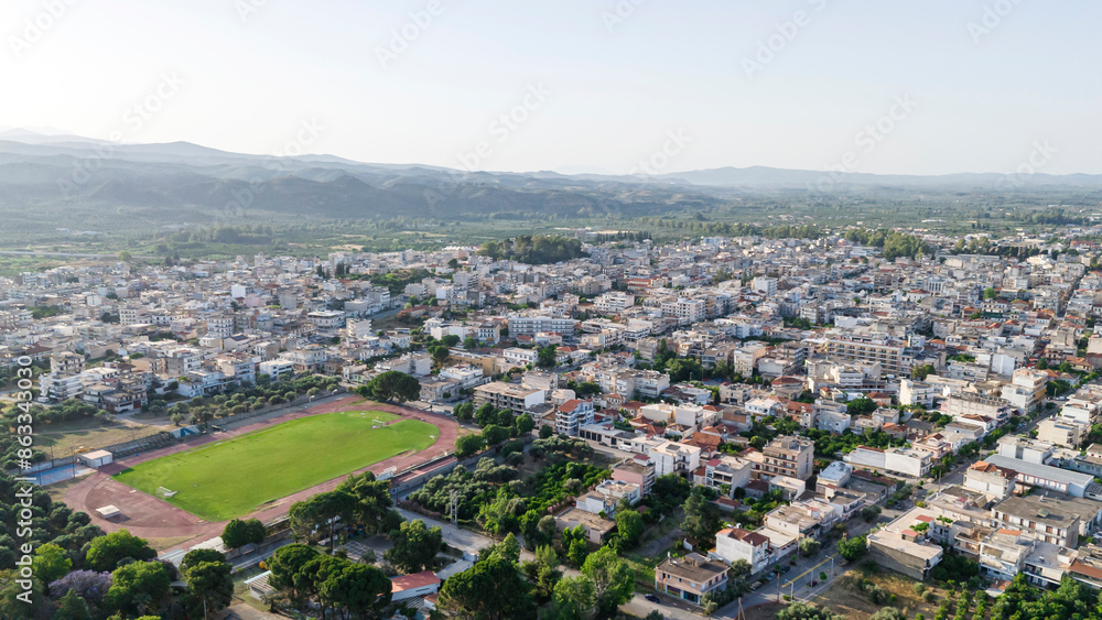 Aerial panoramic view of Sparta city with Taygetus mountains and ancient ruins remains in Peloponnese, Greece Aerial panoramic view of Sparta city with Taygetus mountains and ancient ruins remains in Peloponnese, Greece