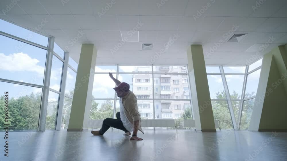 Man Breakdancing in Modern Studio Man Breakdancing in Modern Studio