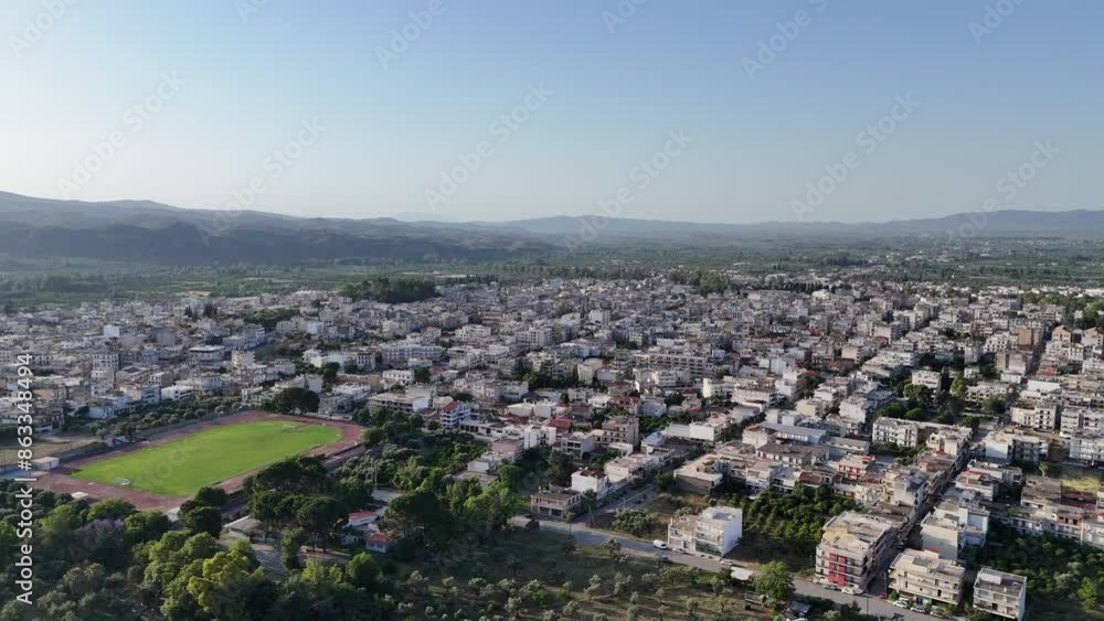 Aerial panoramic view of Sparta city with Taygetus mountains and ancient ruins remains in Peloponnese, Greece Aerial panoramic view of Sparta city with Taygetus mountains and ancient ruins remains in Peloponnese, Greece
