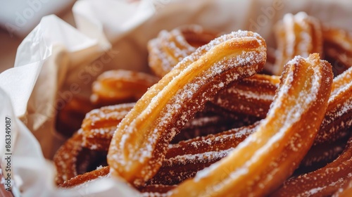 An up close look at a plate of churros