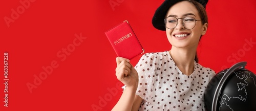 Female tourist with globe a...