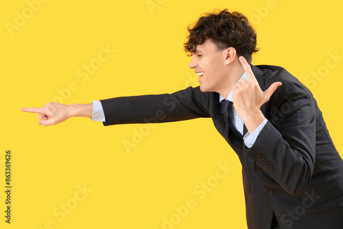 Laughing young businessman ...