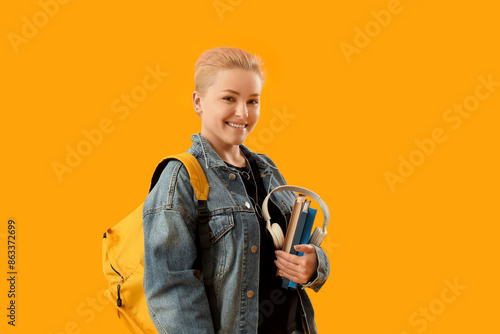 Female student with books a...